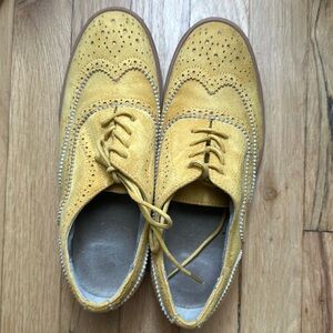 Yellow suede wingtips